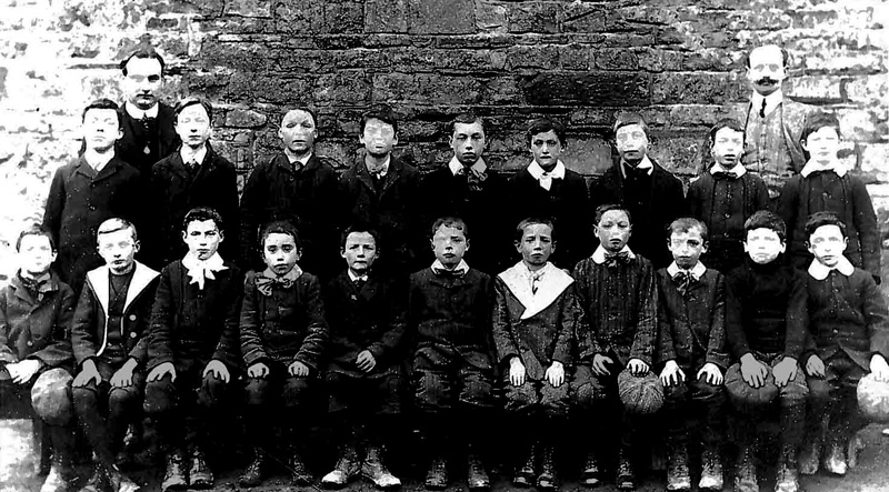 Photo of Edward J. Brown and John Patrick Keys with their students taken outside the school in Pound Street in the early 1900.s